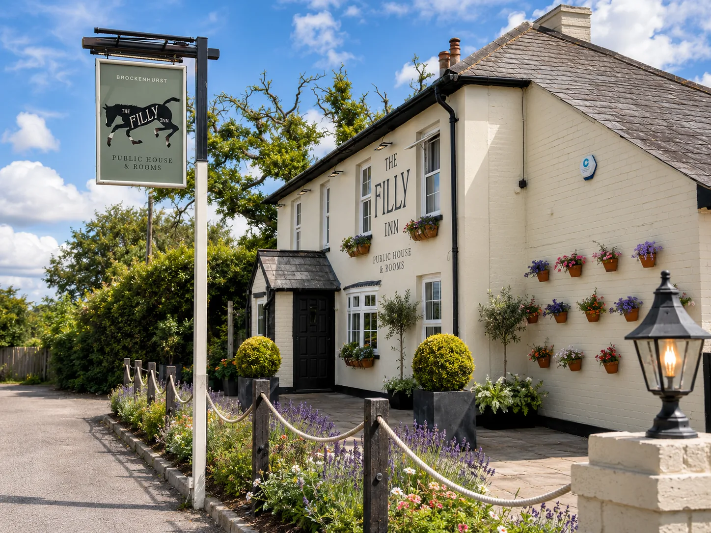 The Filly Inn with a horse illustration on its roadside pub sign