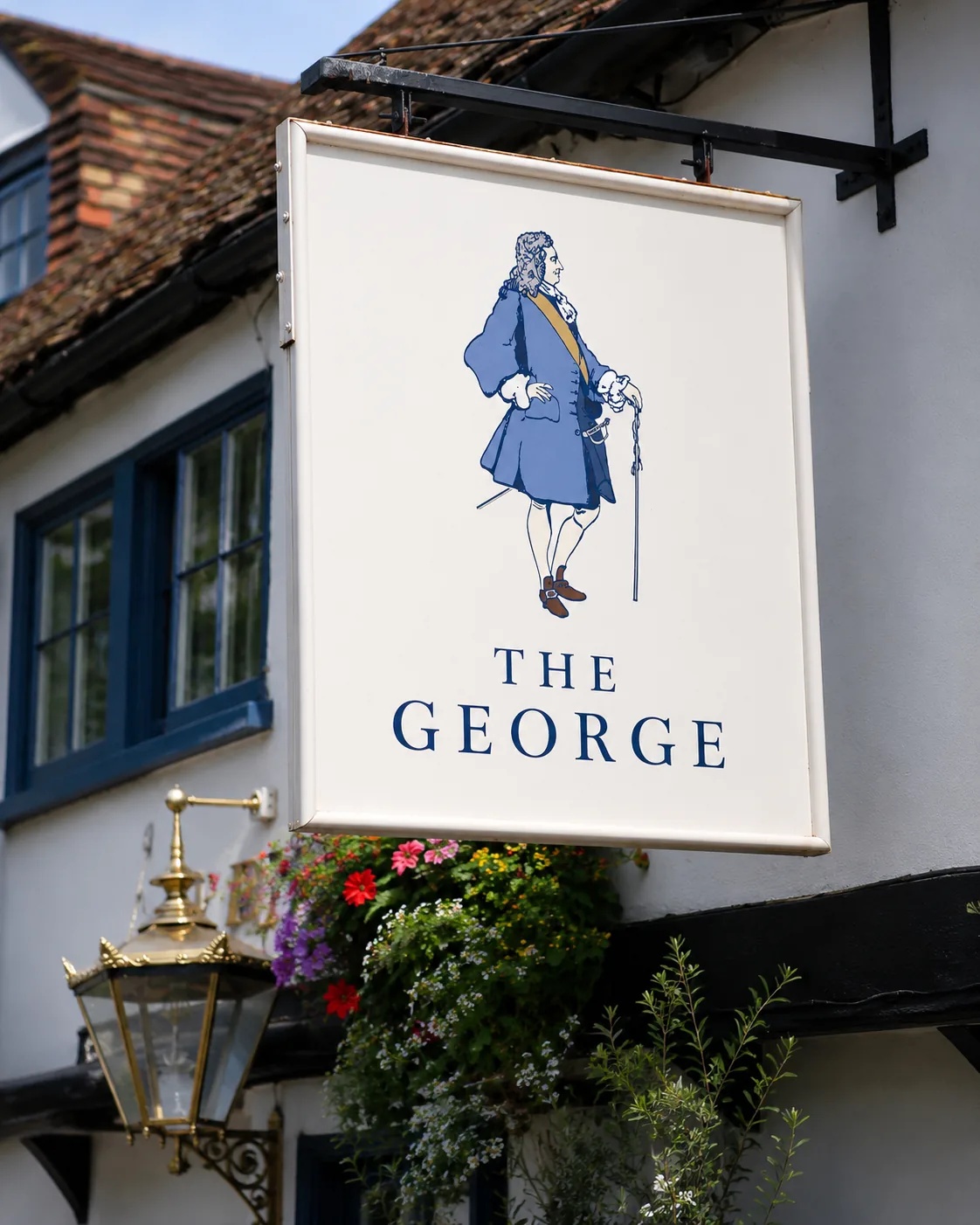 The George hanging pub sign illustrated with a Georgian figure